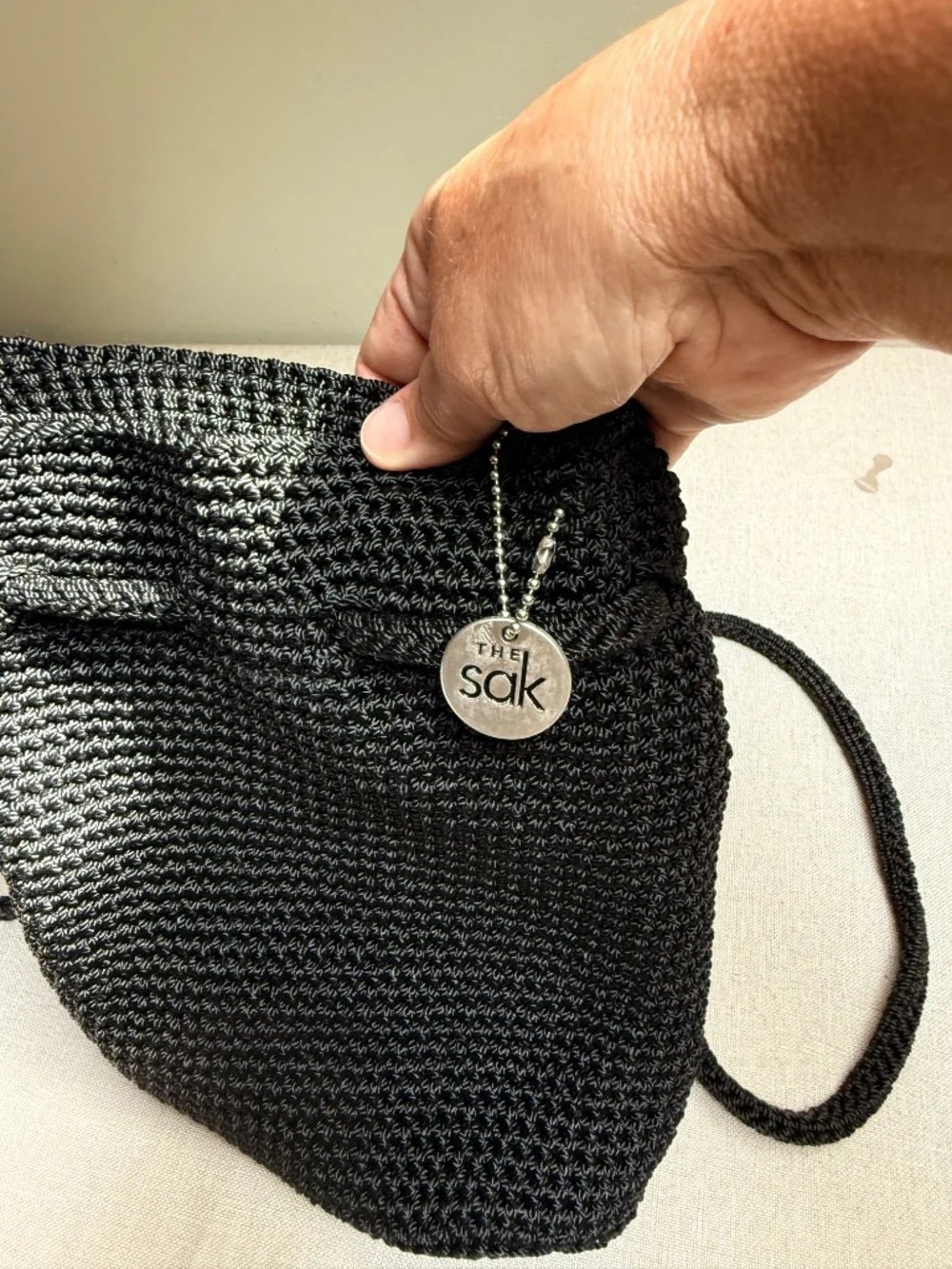The Sak Black Woven Mini Drawstring Backpack
